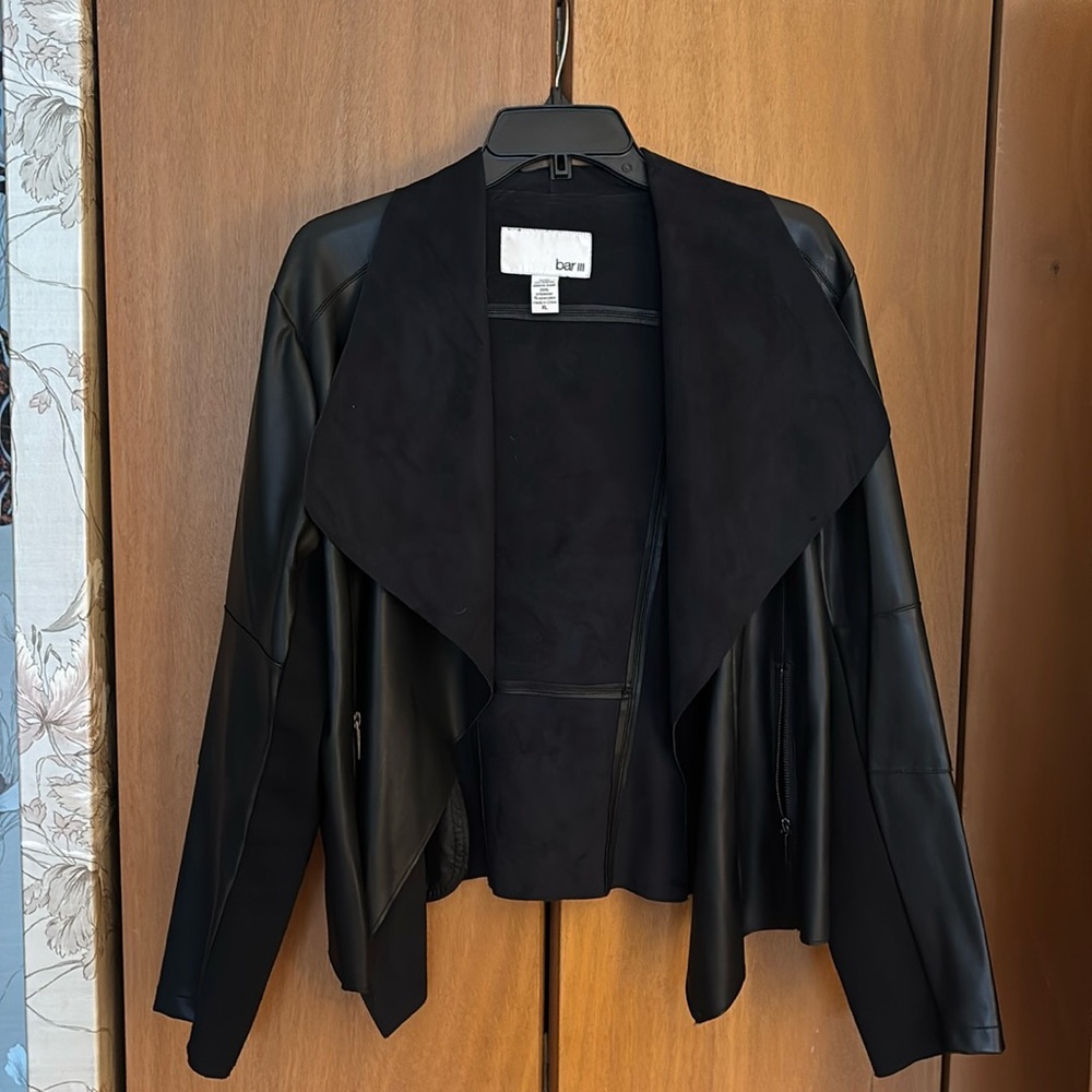 Super cute faux leather and suede jacket.